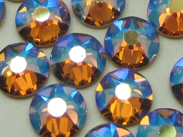 34ss LT. COLORADO TOPAZ SHIMMER HOT FIX European Rhinestones 12pcs.