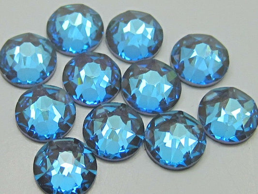 34ss CRYSTAL ARMY GREEN DeLITE HOT FIX SWAROVSKI Rhinestones. 12pcs.