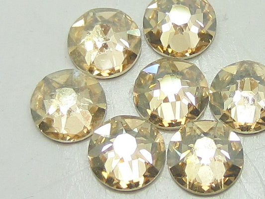 12ss CRYSTAL CHAMPAGNE FLAT BACK European Rhinestones 1gr.