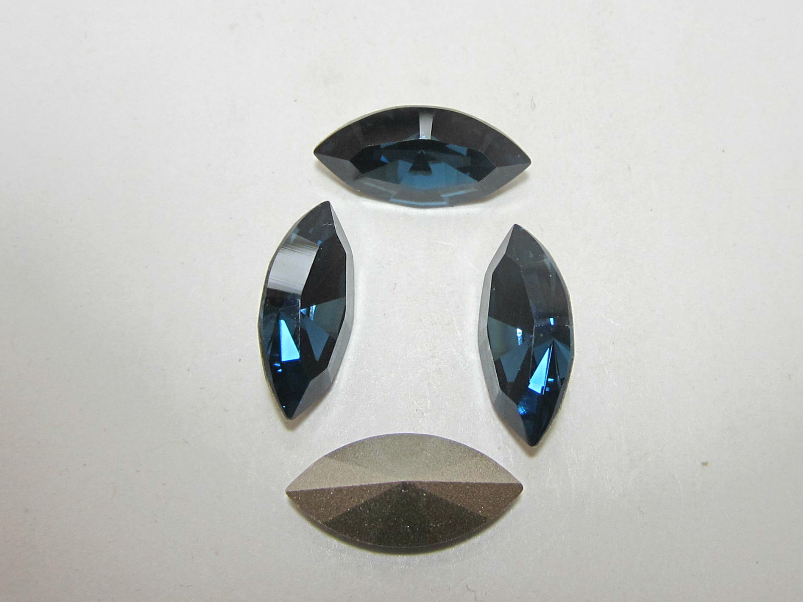 4pcs. 15X7mm MONTANA NAVETTE  POINTED BACK STAR BRIGHT Rhinestones